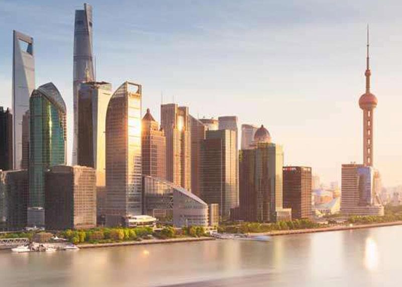 Shanghai skyline with skyscrapers and the Huangpu River.