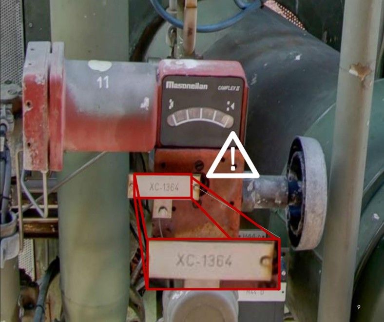 Machinery with a plate that reads XC-1364. A red box zooms in on the plate to show the label with a warning sign next to it.