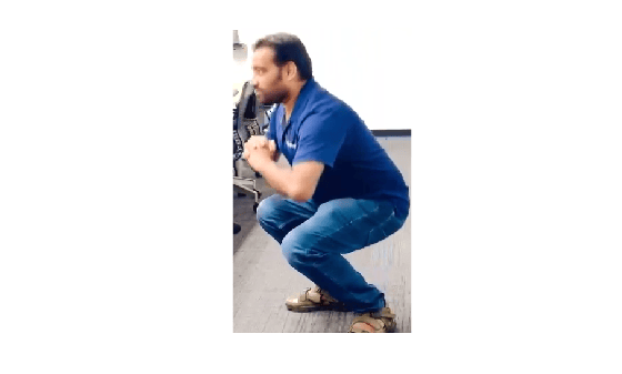 Cropped region showing the detected person in a squat position
